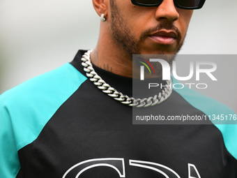 Lewis Hamilton of Mercedes-AMG Petronas F1 Team is arriving into the paddock during Thursday media day of the Spanish GP, the 10th round of...