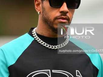 Lewis Hamilton of Mercedes-AMG Petronas F1 Team is arriving into the paddock during Thursday media day of the Spanish GP, the 10th round of...