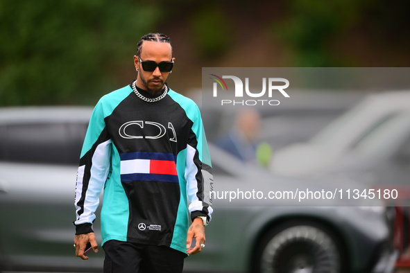 Lewis Hamilton of Mercedes-AMG Petronas F1 Team is arriving into the paddock during Thursday media day of the Spanish GP, the 10th round of...