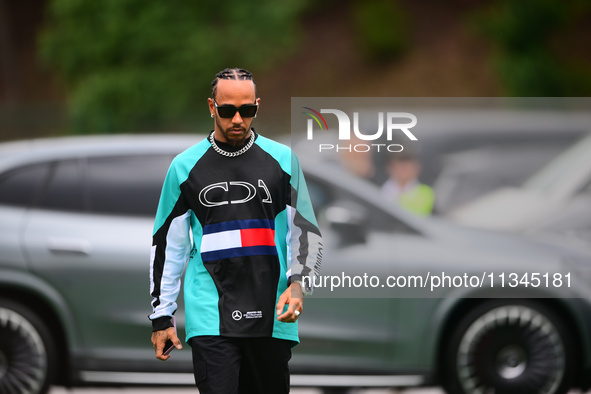 Lewis Hamilton of Mercedes-AMG Petronas F1 Team is arriving into the paddock during Thursday media day of the Spanish GP, the 10th round of...