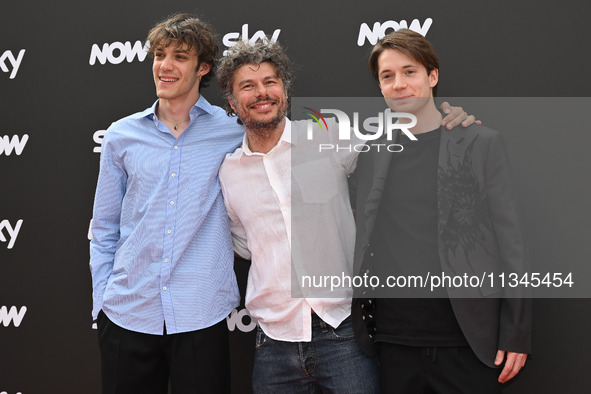 Matteo Giuggioli, Sydney Sibilia, and Elia Nuzzolo are attending the Photocall SKY Program at Barberini Palace in Rome, Italy, on July 19, 2...