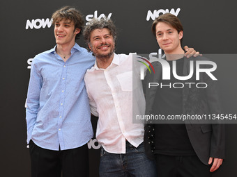 Matteo Giuggioli, Sydney Sibilia, and Elia Nuzzolo are attending the Photocall SKY Program at Barberini Palace in Rome, Italy, on July 19, 2...