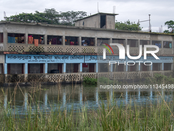 A view is showing a shelter made for flood-affected people in Companiganj, Sylhet, Bangladesh, on Thursday, June 20, 2024. In Sylhet, lashin...