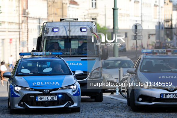 Police are at Wawel Castle during Jaroslaw Kaczynski's monthly arrival at his brother's grave in Krakow, Poland, on June 18, 2023. Every 18t...