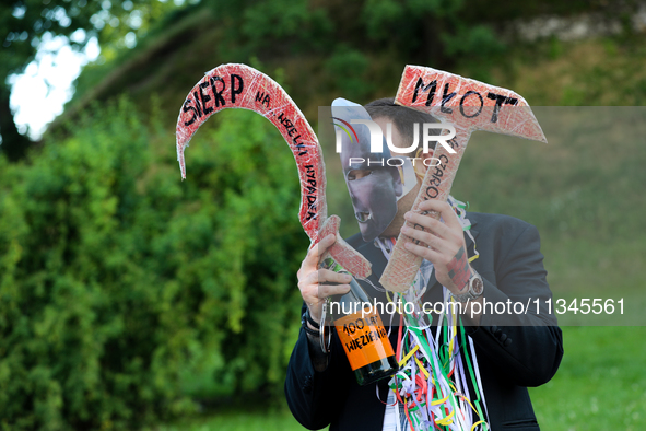 Activists are protesting against Jaroslaw Kaczynski's monthly arrival in front of the entrance to Wawel Castle in Krakow, Poland, on June 18...