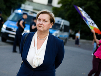 Anna Fotyga, a member of the European Parliament, is walking past the activists during a protest against Jaroslaw Kaczynski's monthly arriva...