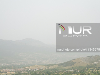 A hazy landscape is seen in L’Aquila, Italy, on June 20th, 2024. High atmospheric pressure from Africa (african anticyclone) is generating a...