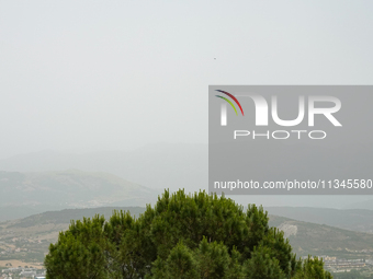 A hazy landscape is seen in L’Aquila, Italy, on June 20th, 2024. High atmospheric pressure from Africa (african anticyclone) is generating a...