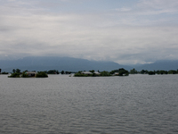 Houses are being seen partially submerged in Companiganj, Sylhet, Bangladesh, on June 20, 2024. In Sylhet, lashing rain and rivers swollen b...