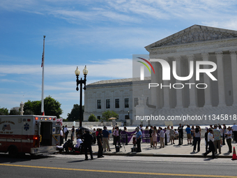 An elderly man is fainting in front of the Supreme Court today as temperatures in Washington, DC, are reaching into the 90s. The court is is...