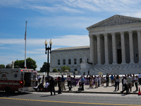 An elderly man is fainting in front of the Supreme Court today as temperatures in Washington, DC, are reaching into the 90s. The court is is...