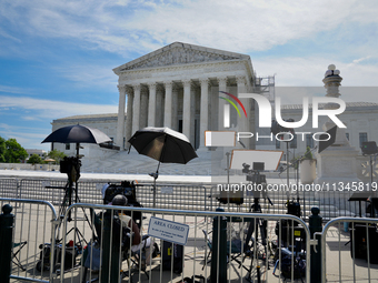 Media crews are waiting in the heat wave in Washington, D.C., as the Supreme Court is preparing to release the final decisions of its term....