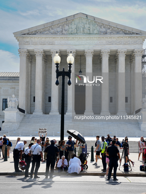 An elderly man is fainting in front of the Supreme Court today as temperatures in Washington, DC, are reaching into the 90s. The court is is...