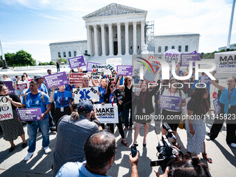 About a dozen pro-life activists are gathering outside the US Supreme Court in Washington, DC, on June 20, 2024, as they await a decision in...