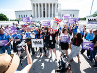 About a dozen pro-life activists are gathering outside the US Supreme Court in Washington, DC, on June 20, 2024, as they await a decision in...