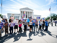 About a dozen pro-life activists are gathering outside the US Supreme Court in Washington, DC, on June 20, 2024, as they await a decision in...