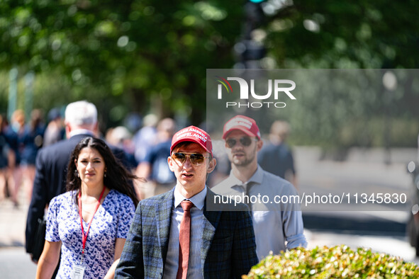 About a dozen pro-life activists are gathering outside the US Supreme Court in Washington, DC, on June 20, 2024, as they await a decision in...