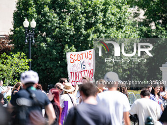 About a dozen pro-life activists are gathering outside the US Supreme Court in Washington, DC, on June 20, 2024, as they await a decision in...