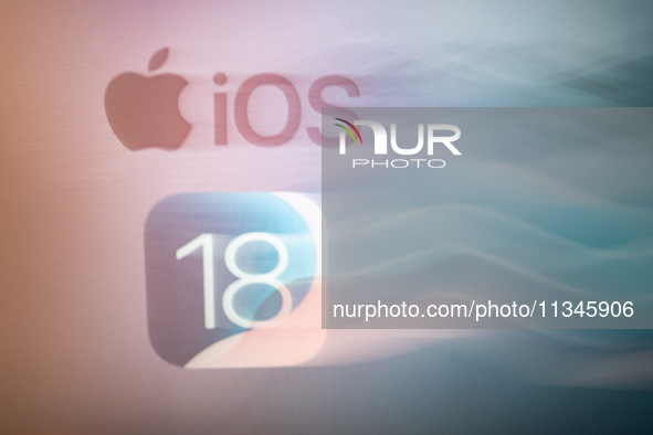 The Apple logo and the iOS 18 operating system logo are seen in this illustration photo (longexposure photo) taken in L’Aquila, Italy, on Ju...