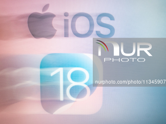 The Apple logo and the iOS 18 operating system logo are seen in this illustration photo (longexposure photo) taken in L’Aquila, Italy, on Ju...