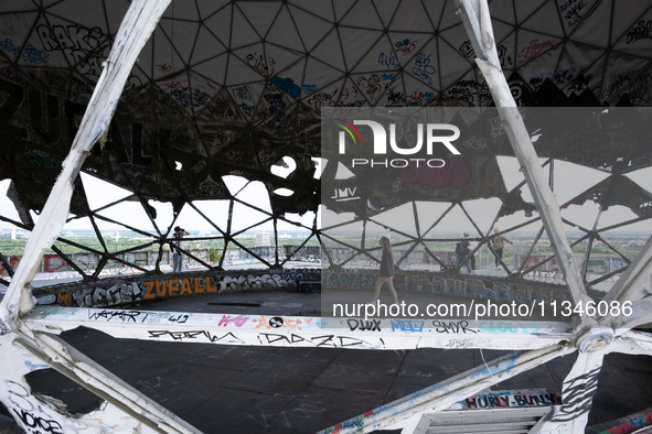 Tourists and locals are visiting Teufelsberg in Berlin, Germany, on June 20, 2024. The Teufelsberg is a rubble hill in the west of Berlin an...