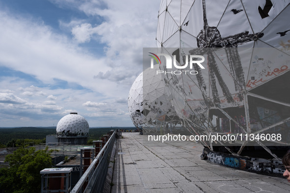 Tourists and locals are visiting Teufelsberg in Berlin, Germany, on June 20, 2024. The Teufelsberg is a rubble hill in the west of Berlin an...