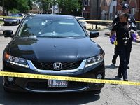 A vehicle is being found at the crime scene riddled with bullet holes and bullet damage. Two male victims are in critical condition after be...