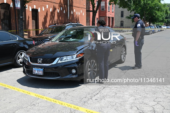 A vehicle is being found at the crime scene riddled with bullet holes and bullet damage. Two male victims are in critical condition after be...