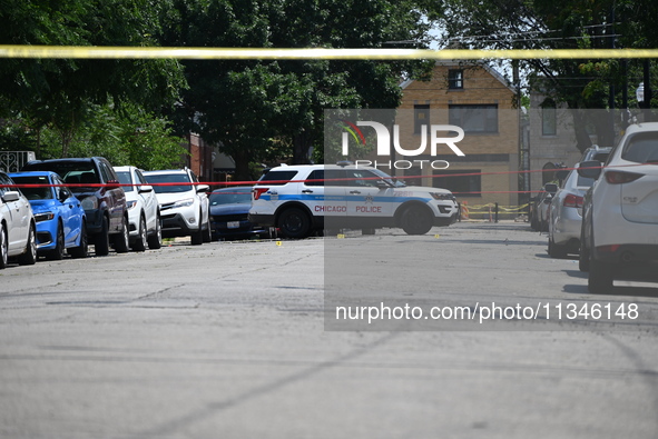 Shell casings are being located at the crime scene. Two male victims are in critical condition after being shot in broad daylight in Chicago...