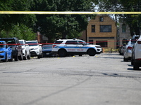 Shell casings are being located at the crime scene. Two male victims are in critical condition after being shot in broad daylight in Chicago...