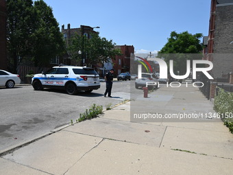 Shell casings are being located at the crime scene. Two male victims are in critical condition after being shot in broad daylight in Chicago...