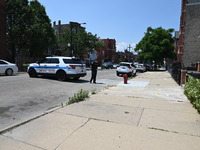 Shell casings are being located at the crime scene. Two male victims are in critical condition after being shot in broad daylight in Chicago...