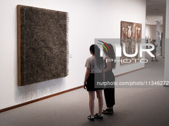 People are visiting the New National Gallery Of Berlin, Neue Nationalgalerie in Berlin, Germany, on June 20, 2024. (