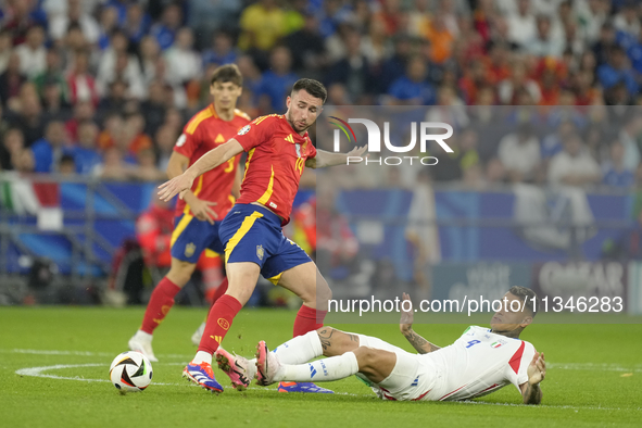 Aymeric Laporte centre-back of Spain and Al-Nassr FC and Gianluca Scamacca centre-forward of Italy and Atalanta BC  compete for the ball dur...