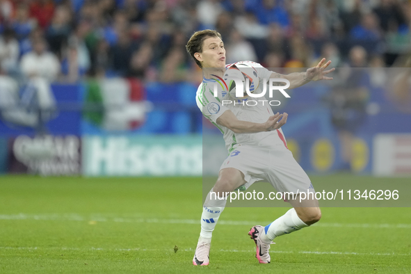 Nicolo Barella central midfield of Italy and Inter Milan controls the ball during the UEFA EURO 2024 group stage match between Spain and Ita...