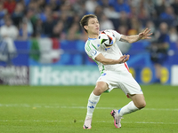 Nicolo Barella central midfield of Italy and Inter Milan controls the ball during the UEFA EURO 2024 group stage match between Spain and Ita...