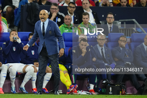 Luciano Spalletti head coach of Italy gives instructions during the UEFA EURO 2024 group stage match between Spain and Italy at Arena AufSch...