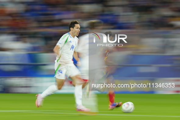 Federico Chiesa left winger of Italy and Juventus FC in action during the UEFA EURO 2024 group stage match between Spain and Italy at Arena...