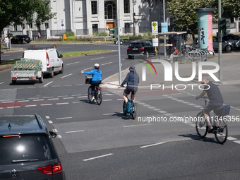 People are cycling in Berlin, Germany, on June 20, 2024. (