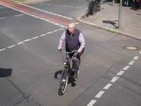 A man is cycling in Berlin, Germany, on June 20, 2024. (