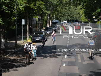 People are cycling in Berlin, Germany, on June 20, 2024. (