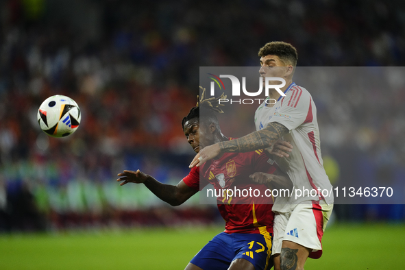 Giovanni Di Lorenzo right-back of Italy and SSC Napoli and Nico Williams left winger of Spain and Athletic Club Bilbao compete for the ball...