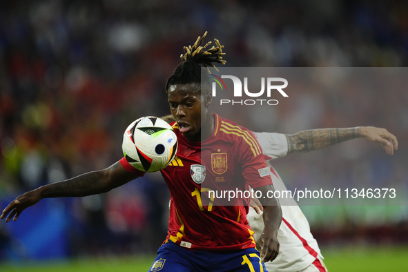 Giovanni Di Lorenzo right-back of Italy and SSC Napoli and Nico Williams left winger of Spain and Athletic Club Bilbao compete for the ball...