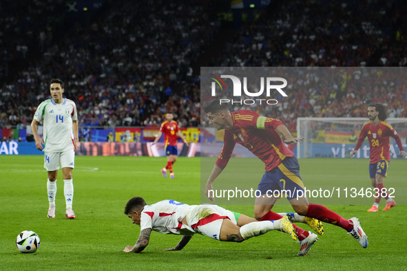 Alvaro Morata centre-forward of Spain and Atletico de Madrid and Giovanni Di Lorenzo right-back of Italy and SSC Napoli compete for the ball...