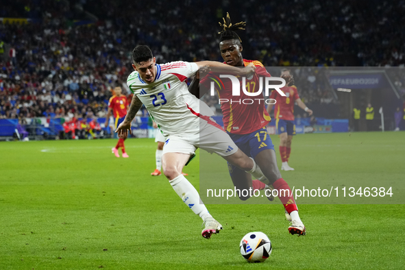 Alessandro Bastoni centre-back of Italy and Inter Milan and Nico Williams left winger of Spain and Athletic Club Bilbao during the UEFA EURO...