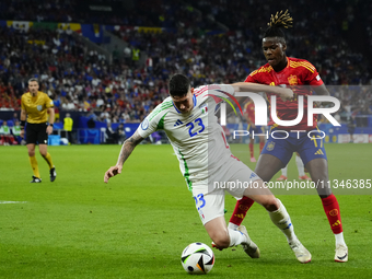 Alessandro Bastoni centre-back of Italy and Inter Milan and Nico Williams left winger of Spain and Athletic Club Bilbao during the UEFA EURO...