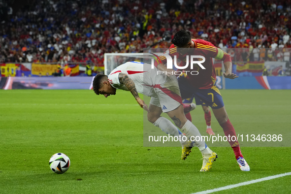 Alvaro Morata centre-forward of Spain and Atletico de Madrid and Giovanni Di Lorenzo right-back of Italy and SSC Napoli compete for the ball...