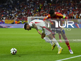 Alvaro Morata centre-forward of Spain and Atletico de Madrid and Giovanni Di Lorenzo right-back of Italy and SSC Napoli compete for the ball...