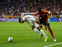 Alvaro Morata centre-forward of Spain and Atletico de Madrid and Giovanni Di Lorenzo right-back of Italy and SSC Napoli compete for the ball...