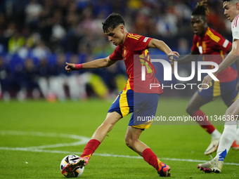 Pedri central midfield of Spain and FC Barcelona does passed  during the UEFA EURO 2024 group stage match between Spain and Italy at Arena A...